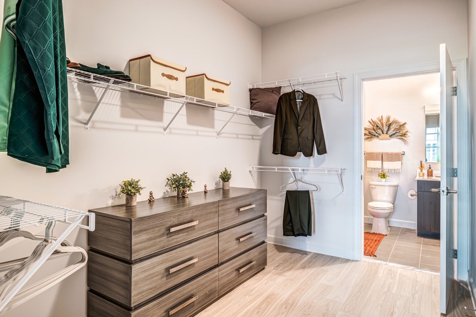 Walk-in closet that leads to bathroom