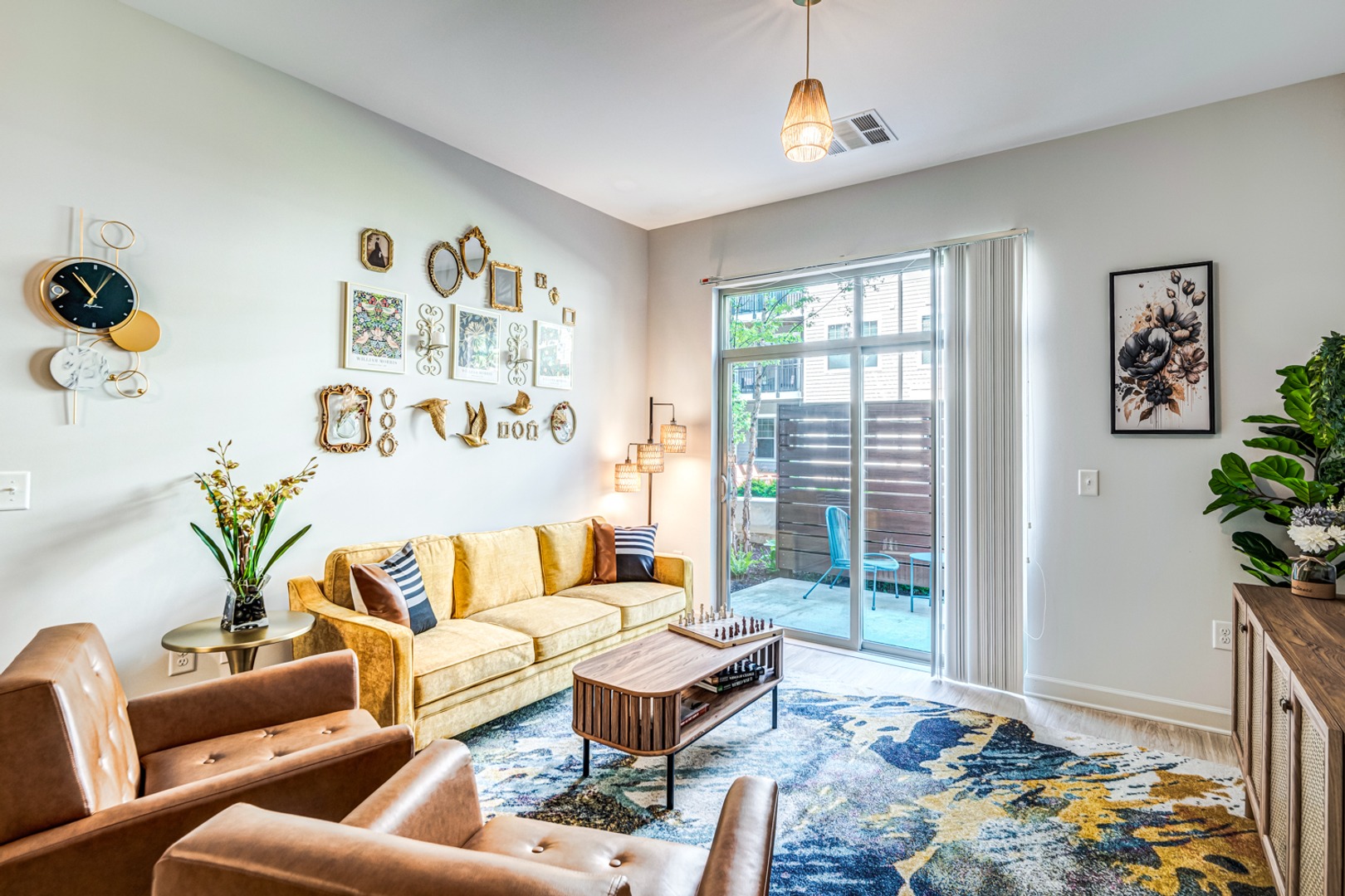 Spacious living room with view of balcony